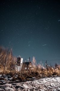 Preview wallpaper night, starry sky, bushes, buildings, abandoned, countryside