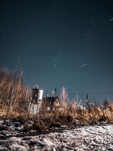 Preview wallpaper night, starry sky, bushes, buildings, abandoned, countryside