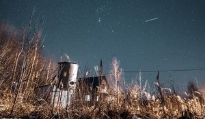 Preview wallpaper night, starry sky, bushes, buildings, abandoned, countryside