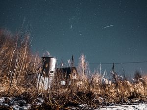 Preview wallpaper night, starry sky, bushes, buildings, abandoned, countryside