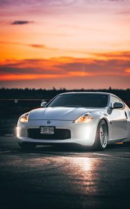 Preview wallpaper nissan 350z, nissan, sports car, car, headlights, sunset