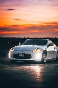 Preview wallpaper nissan 350z, nissan, sports car, car, headlights, sunset