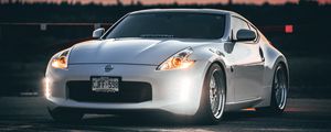 Preview wallpaper nissan 350z, nissan, sports car, car, headlights, sunset