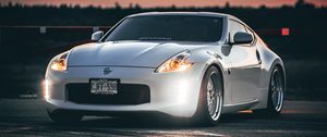 Preview wallpaper nissan 350z, nissan, sports car, car, headlights, sunset