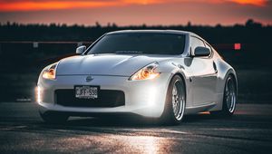 Preview wallpaper nissan 350z, nissan, sports car, car, headlights, sunset