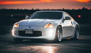 Preview wallpaper nissan 350z, nissan, sports car, car, headlights, sunset