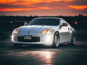 Preview wallpaper nissan 350z, nissan, sports car, car, headlights, sunset