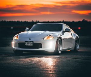 Preview wallpaper nissan 350z, nissan, sports car, car, headlights, sunset