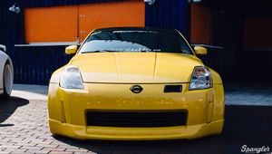 Preview wallpaper nissan 350z, yellow, sports car, front view, tuning