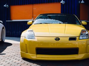 Preview wallpaper nissan 350z, yellow, sports car, front view, tuning