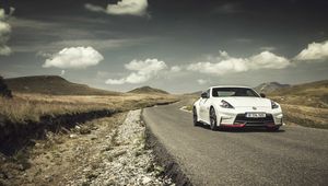 Preview wallpaper nissan, 370z, hills, road, side view