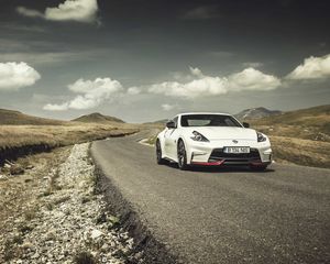 Preview wallpaper nissan, 370z, hills, road, side view