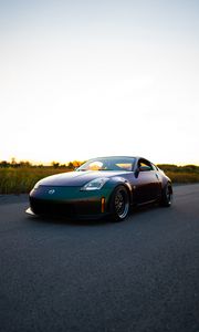 Preview wallpaper nissan, car, sports car, road