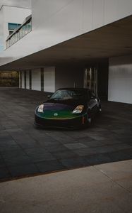 Preview wallpaper nissan, car, sports car, front view, building