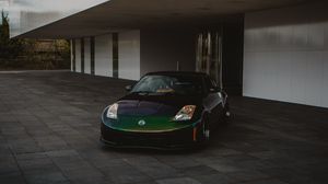 Preview wallpaper nissan, car, sports car, front view, building
