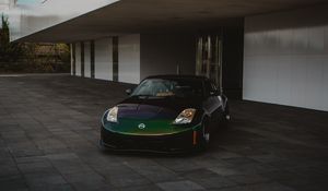 Preview wallpaper nissan, car, sports car, front view, building