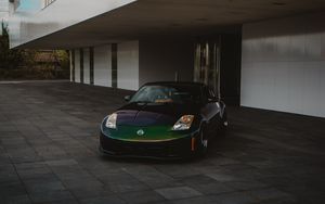 Preview wallpaper nissan, car, sports car, front view, building