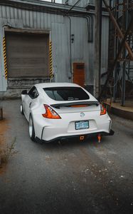 Preview wallpaper nissan, car, sports car, rear view, garage