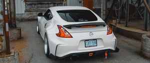 Preview wallpaper nissan, car, sports car, rear view, garage