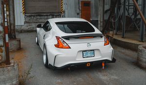 Preview wallpaper nissan, car, sports car, rear view, garage