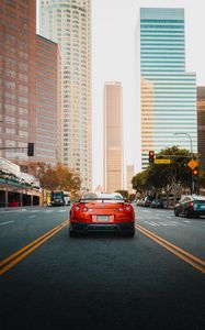 Preview wallpaper nissan gt-r, nissan, car, red, city, road