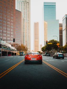 Preview wallpaper nissan gt-r, nissan, car, red, city, road