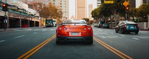 Preview wallpaper nissan gt-r, nissan, car, red, city, road