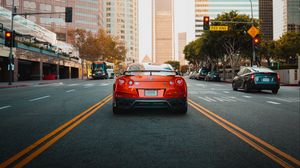 Preview wallpaper nissan gt-r, nissan, car, red, city, road
