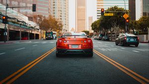 Preview wallpaper nissan gt-r, nissan, car, red, city, road