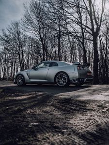 Preview wallpaper nissan gt-r, nissan, car, gray, trees, road