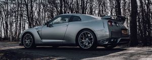 Preview wallpaper nissan gt-r, nissan, car, gray, trees, road