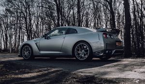 Preview wallpaper nissan gt-r, nissan, car, gray, trees, road