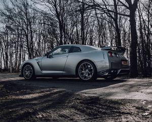 Preview wallpaper nissan gt-r, nissan, car, gray, trees, road