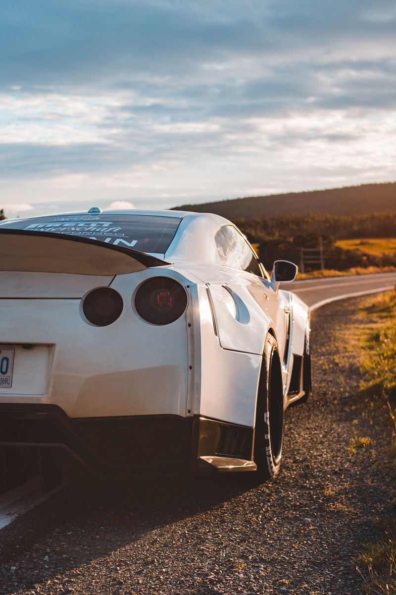 800x1200 Wallpaper nissan gt-r, nissan, sportscar, car, white, rear view