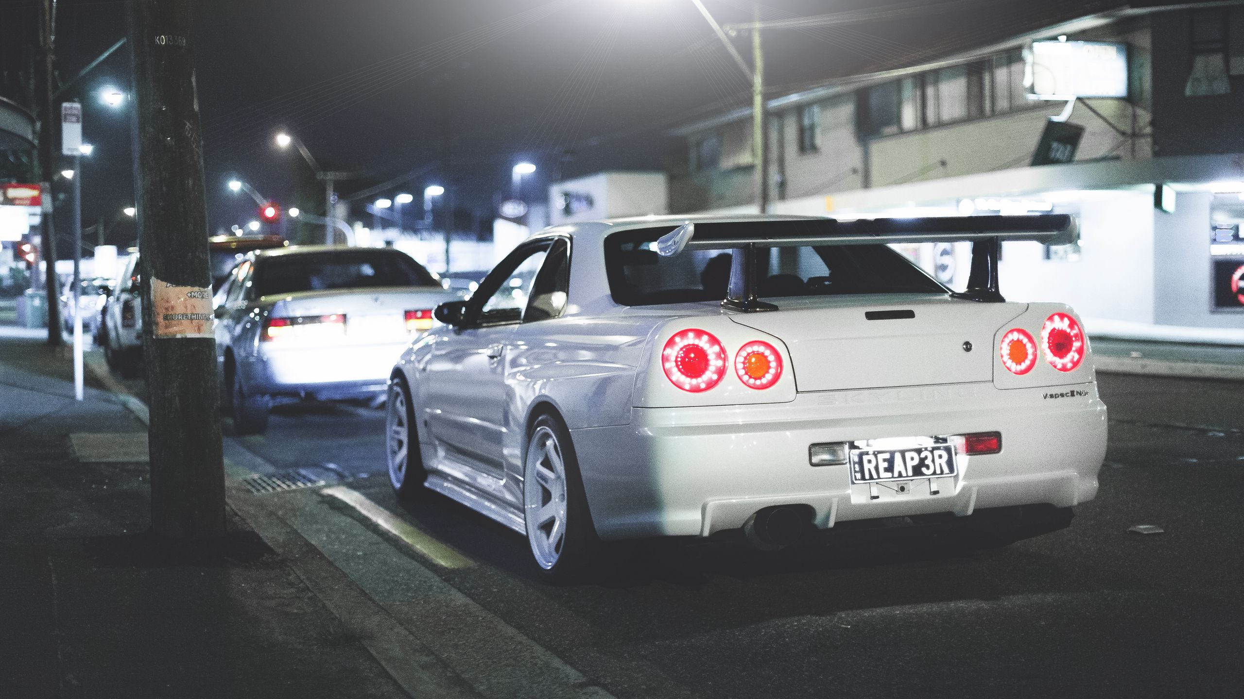 Download Wallpaper 2560x1440 Nissan Skyline R34 Gt R Rear View Widescreen 169 Hd Background 