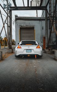 Preview wallpaper nissan, sports car, car, rear view, garage