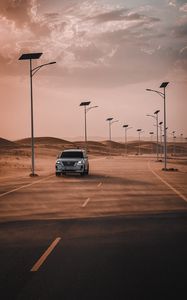 Preview wallpaper nissan, suv, car, road, desert