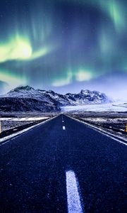 Preview wallpaper northern lights, aurora, road, marking, mountains, snow