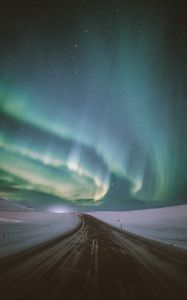 Preview wallpaper northern lights, aurora, road, snow, starry sky