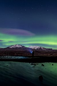 Preview wallpaper northern lights, aurora, silhouette, mountains, snow, winter, starry sky, night