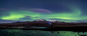 Preview wallpaper northern lights, aurora, silhouette, mountains, snow, winter, starry sky, night