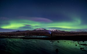 Preview wallpaper northern lights, aurora, silhouette, mountains, snow, winter, starry sky, night
