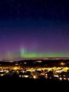 Preview wallpaper northern lights, aurora, starry sky, village, city, light, stars, scotland