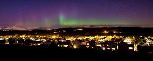 Preview wallpaper northern lights, aurora, starry sky, village, city, light, stars, scotland