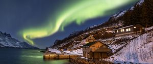 Preview wallpaper northern lights, building, slope, coast