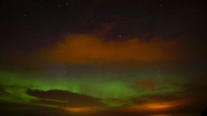 Preview wallpaper northern lights, clouds, stars, space, dark