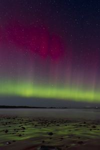 Preview wallpaper northern lights, coast, sand, pebbles, sea