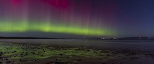 Preview wallpaper northern lights, coast, sand, pebbles, sea