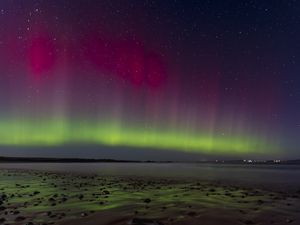 Preview wallpaper northern lights, coast, sand, pebbles, sea