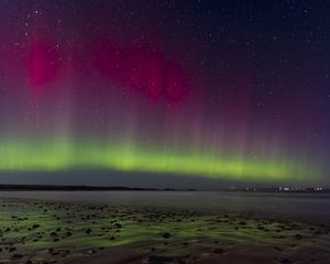Preview wallpaper northern lights, coast, sand, pebbles, sea